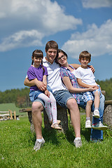 Image showing happy young family have fun outdoors