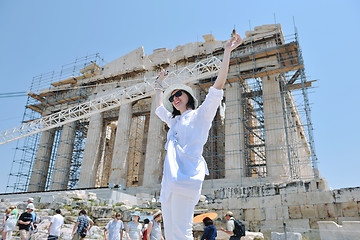 Image showing Greek woman on the streets of Oia, Santorini, Greece