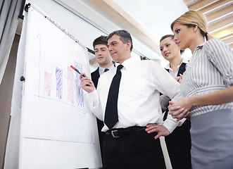 Image showing Senior business man giving a presentation