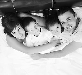 Image showing happy young Family in their bedroom