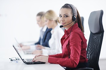 Image showing business woman group with headphones