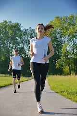 Image showing Young couple jogging at morning