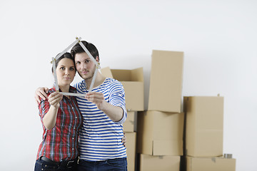 Image showing Young couple moving in new home