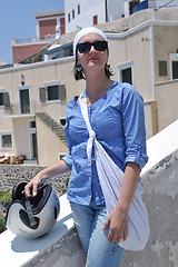 Image showing Greek woman on the streets of Oia, Santorini, Greece