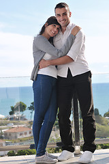 Image showing couple relaxing on balcony