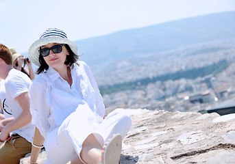 Image showing Greek woman on the streets of Oia, Santorini, Greece