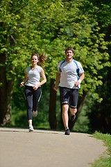 Image showing Young couple jogging at morning