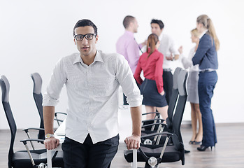 Image showing young business man at meeting