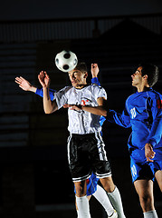 Image showing football players in action for the ball