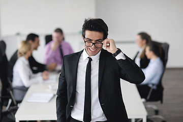 Image showing young business man at meeting