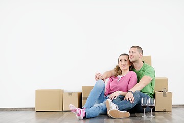 Image showing Young couple moving in new house