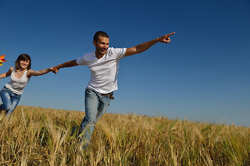 Image showing happy couple in wheat field