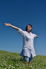 Image showing young woman in wheat field at summer