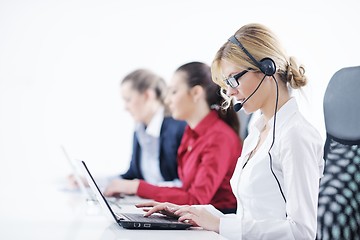 Image showing business woman group with headphones