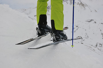 Image showing skiing on fresh snow at winter season at beautiful sunny day