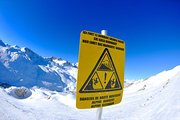 Image showing Sign board at High mountains under snow in the winter