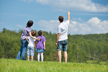 Image showing happy young family have fun outdoors