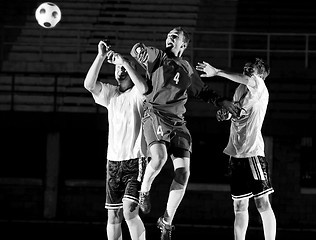 Image showing football players in action for the ball