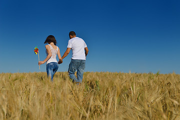 Image showing happy couple in wheat field