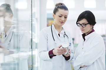 Image showing team of pharmacist chemist woman  in pharmacy drugstore