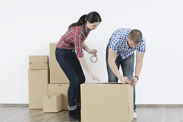 Image showing Young couple moving in new home