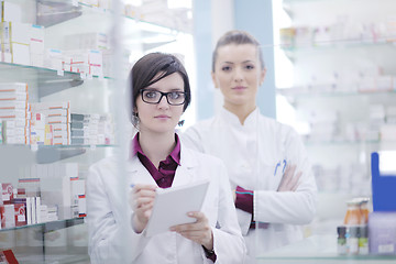 Image showing team of pharmacist chemist woman  in pharmacy drugstore