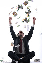 Image showing Business man holding money