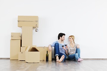 Image showing Young couple moving in new house