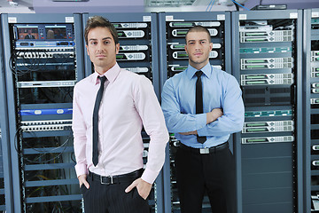 Image showing it enineers in network server room