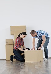 Image showing Young couple moving in new house