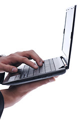 Image showing business man work on mini laptop