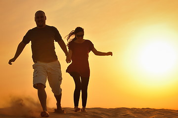 Image showing couple enjoying the sunset