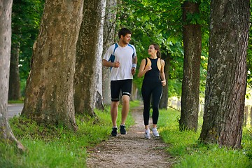 Image showing Young couple jogging