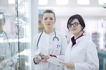 Image showing team of pharmacist chemist woman  in pharmacy drugstore