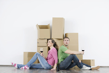 Image showing Young couple moving in new home