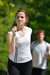 Image showing Young couple jogging at morning