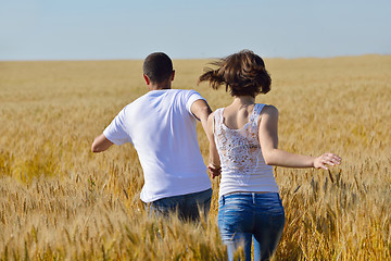 Image showing happy couple in wheat field