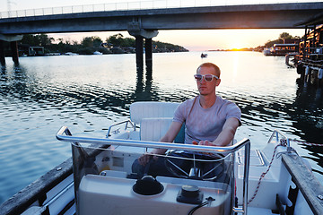 Image showing portrait of happy young man on boat