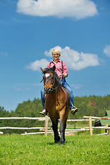 Image showing happy woman  on  horse