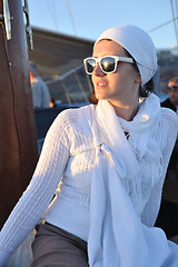 Image showing Greek woman on the streets of Oia, Santorini, Greece