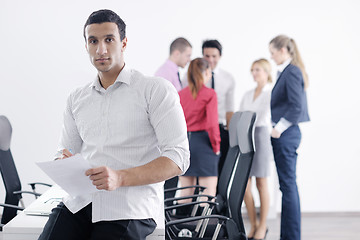 Image showing young business man at meeting