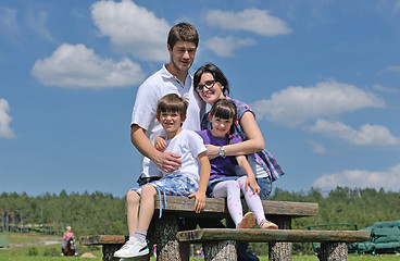 Image showing happy young family have fun outdoors