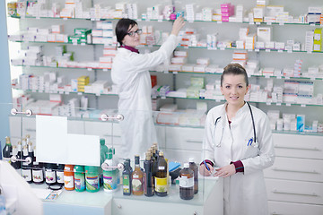 Image showing team of pharmacist chemist woman  in pharmacy drugstore