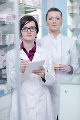 Image showing team of pharmacist chemist woman  in pharmacy drugstore