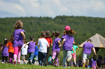 Image showing happy kids group  have fun in nature