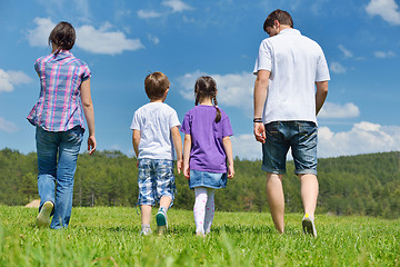 Image showing happy young family have fun outdoors