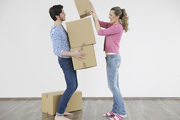 Image showing Young couple moving in new home