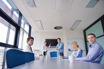 Image showing business people in a meeting at office