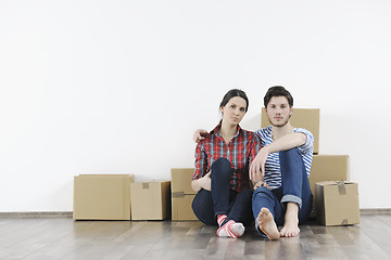 Image showing Young couple moving in new home