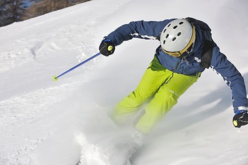 Image showing skiing on fresh snow at winter season at beautiful sunny day